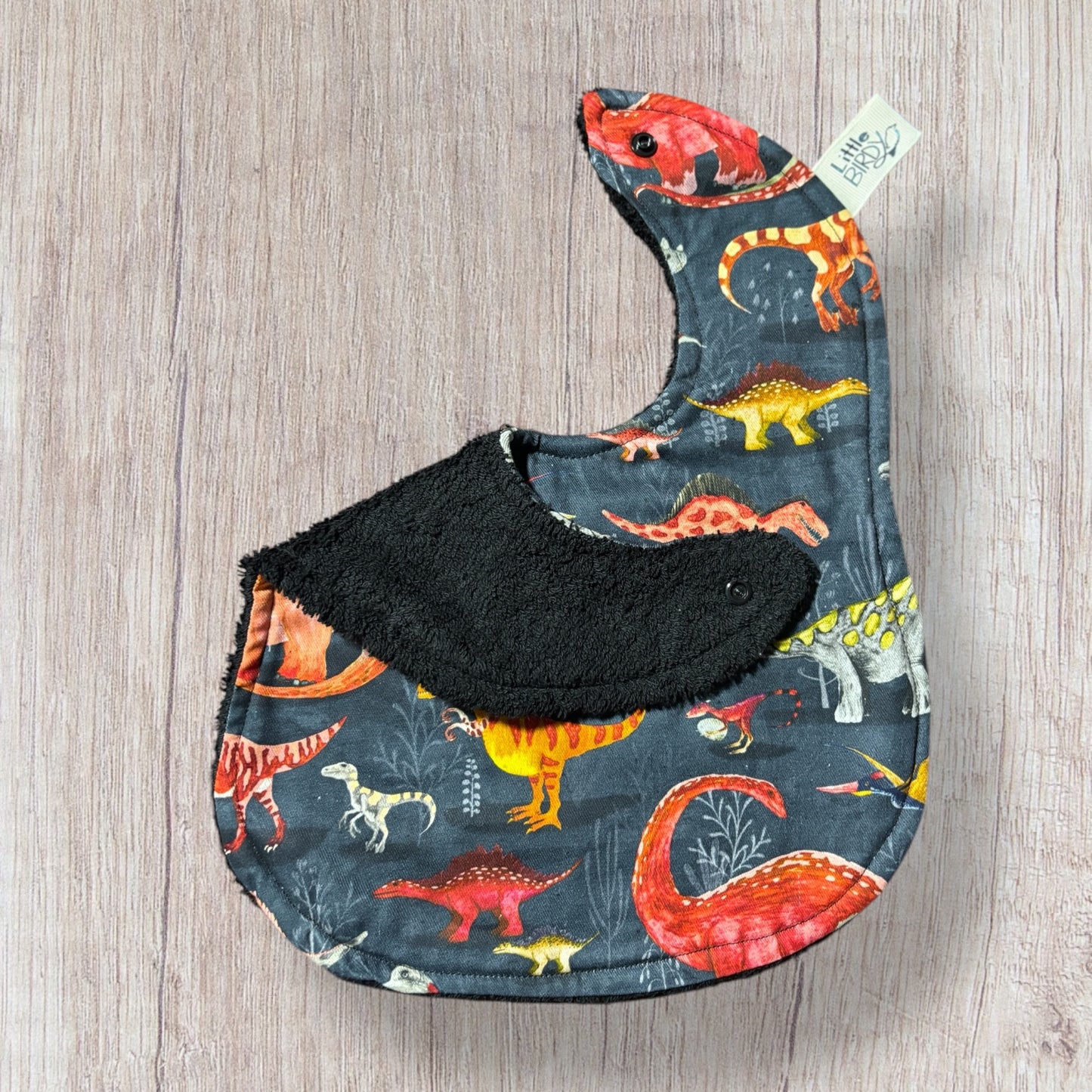 Dinosaur baby bib