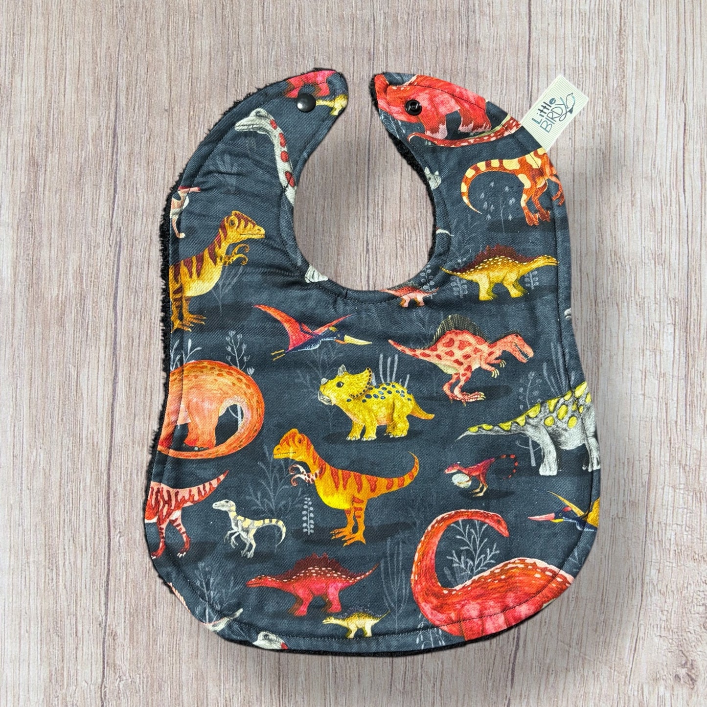 Dinosaur baby bib