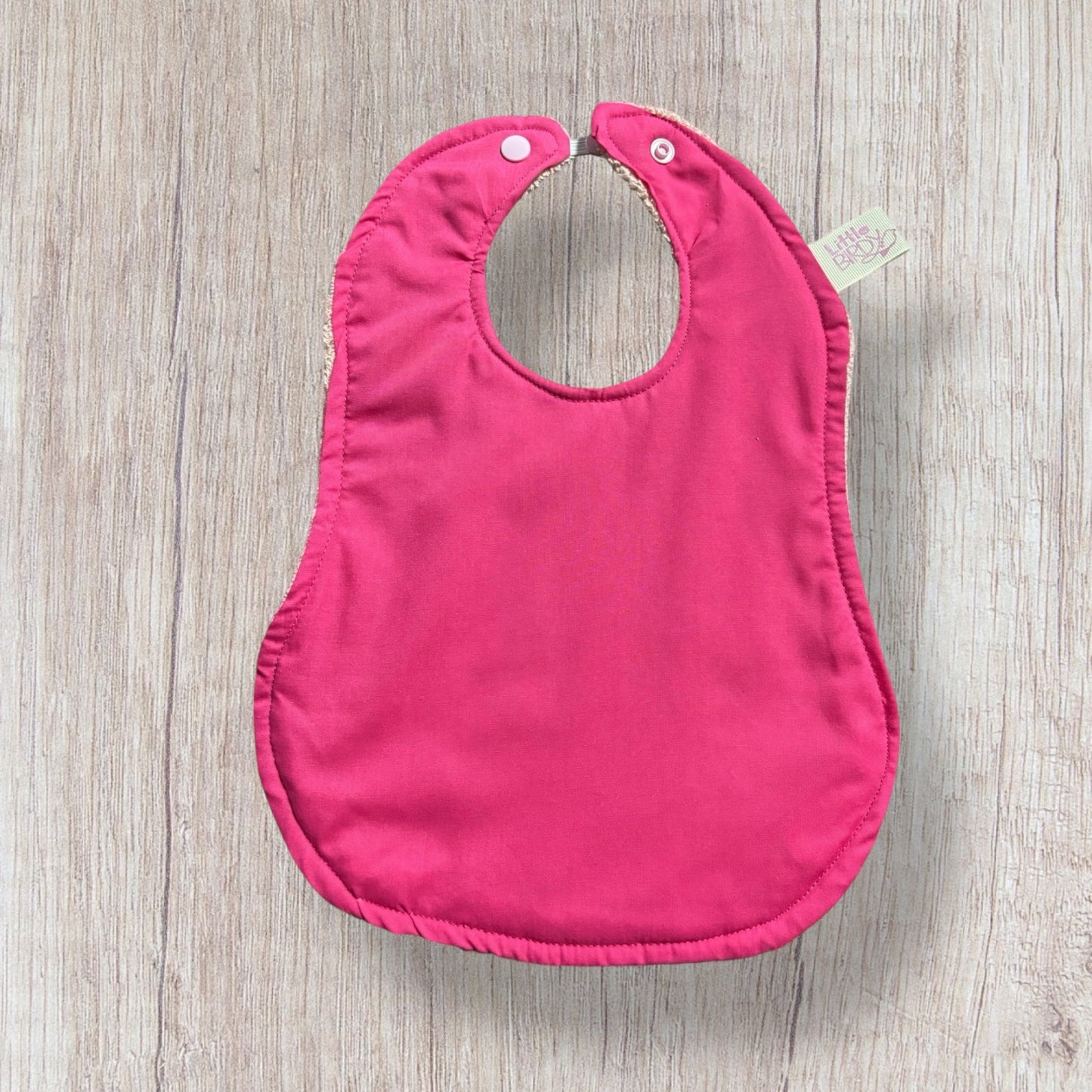 Pink baby bib